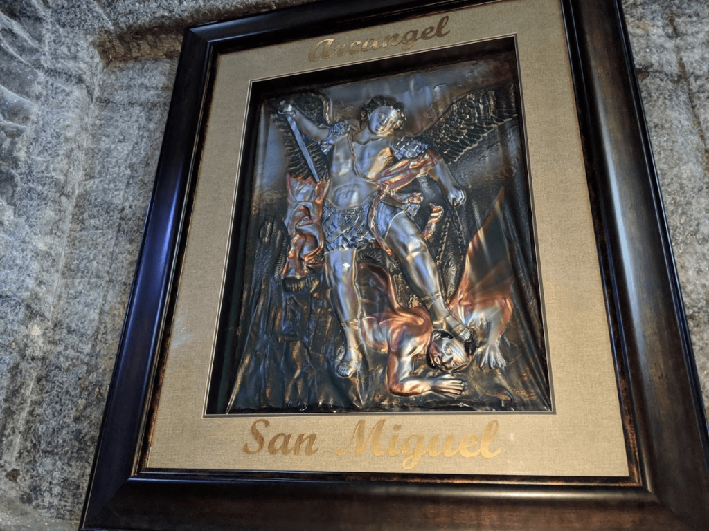 Archangel Michael defeating Satan in battle