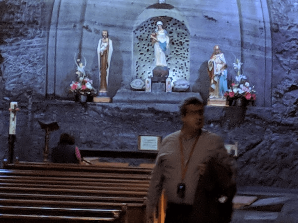 Marta praying in one of the front pews of the Chapel